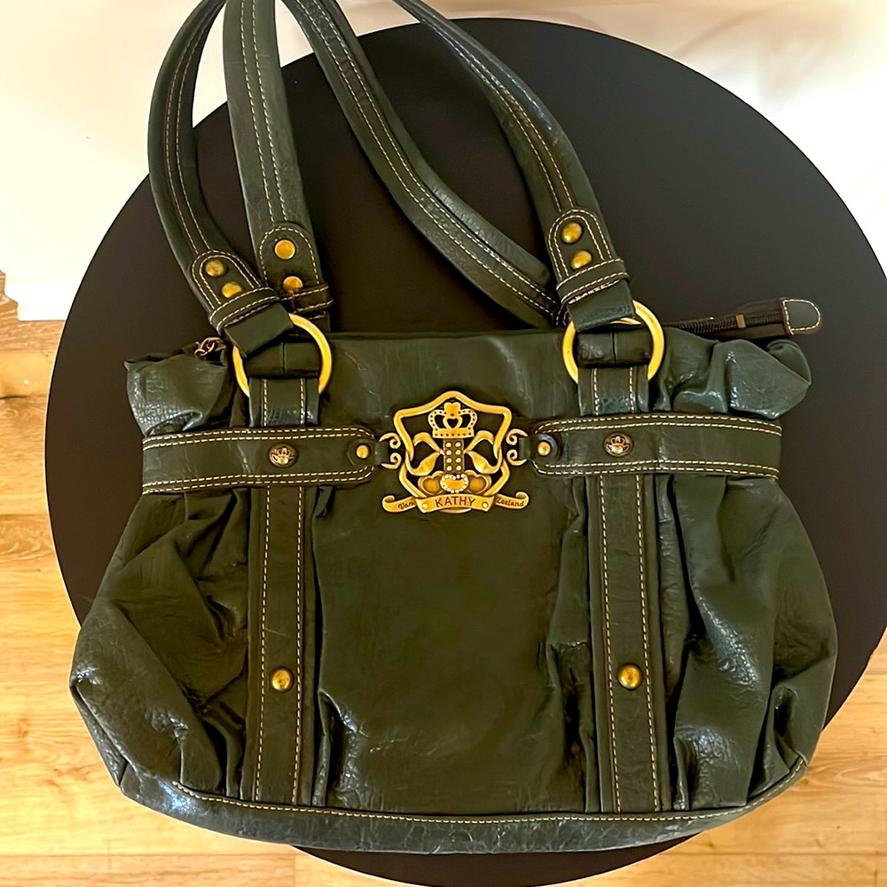 BNWOT Kathy Van Zeeland Forest Green shoulder bag. Rare Signature Gold emblem.